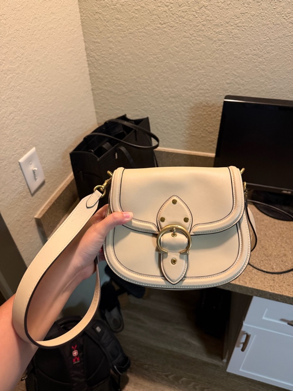 Coach Cream Leather Saddle Crossbody Bag with Gold Ring Accent